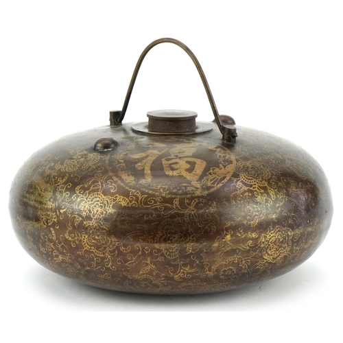 1300 - Chinese bronzed metal flask decorated with script and flowers, 20cm in diameter