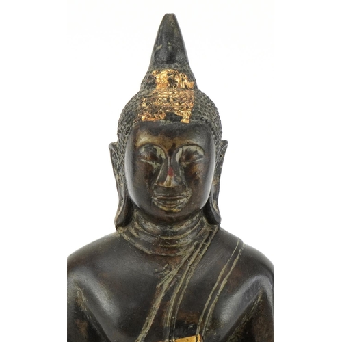 185 - Oriental gilt bronze Buddha, 24cm high