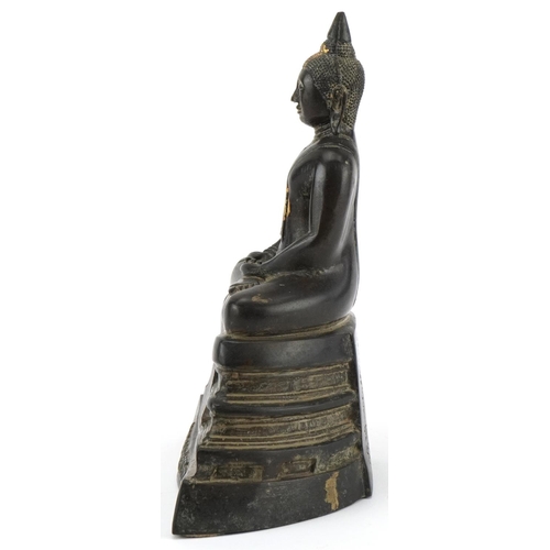 185 - Oriental gilt bronze Buddha, 24cm high