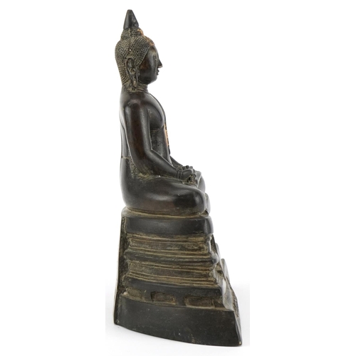 185 - Oriental gilt bronze Buddha, 24cm high