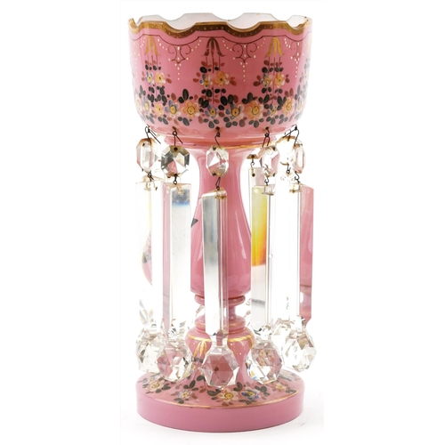 83 - Victorian opaline pink lustre hand painted with flowers, having clear glass drops, 36cm high