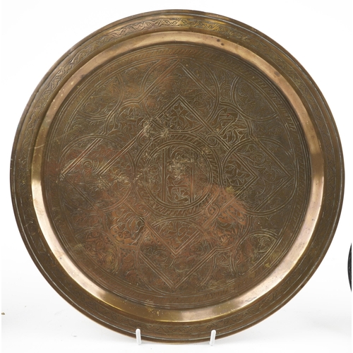 385 - Islamic copper silver overlaid tray decorated with fish and flowers, Indian brass tray decorated wit... 