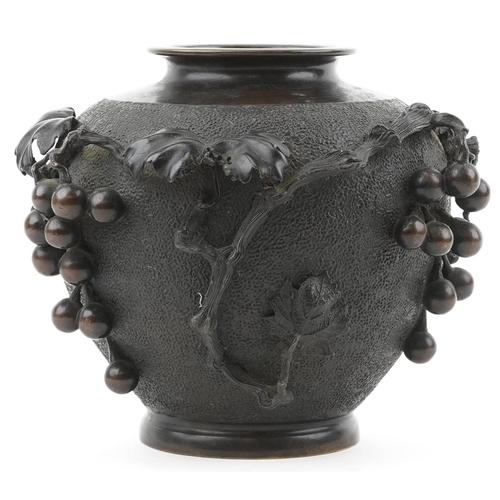 Japanese bronze vase relief moulded with grapes and vines, impressed signature to the base, 23cm high