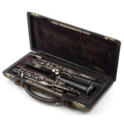 1231 - French cased clarinet, A Robert Paris, 14 Rue de Hauteville