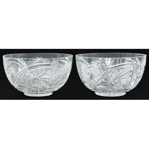 84 - Large pair of good quality glass bowls cut with wheel design and star bases, each 29cm in diameter