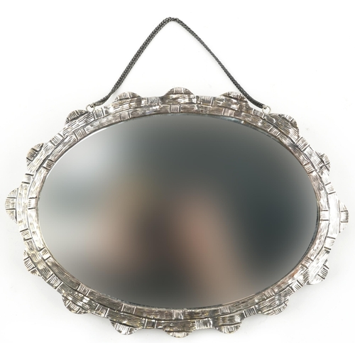 380 - Turkish silver vanity mirror, 25cm wide