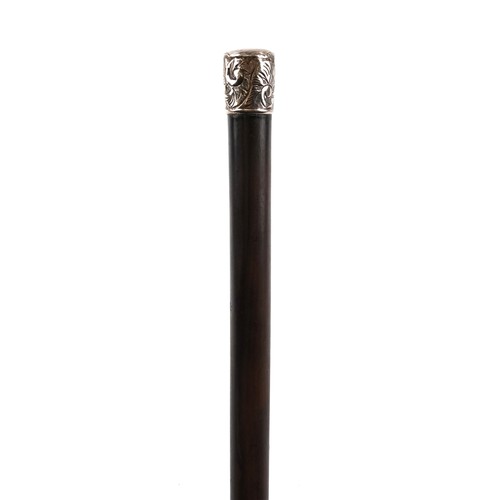 363 - Hardwood walking stick with floral engraved white metal pommel and brass ferule, 87cm in length