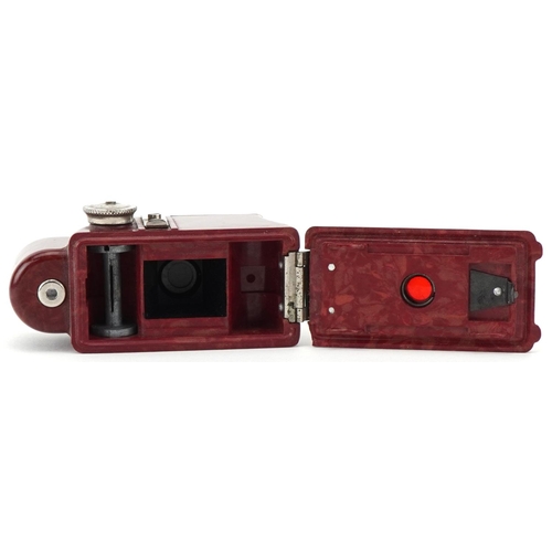 756 - Burgundy Coronet Midget camera, 6cm high