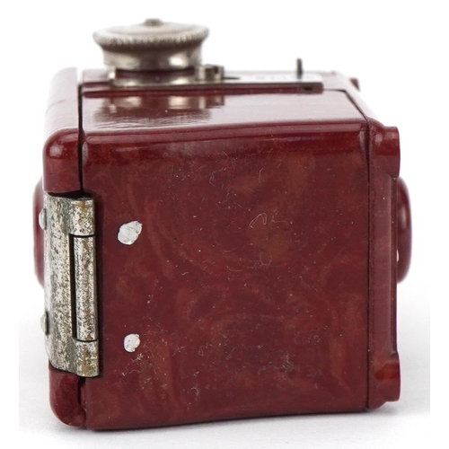 756 - Burgundy Coronet Midget camera, 6cm high