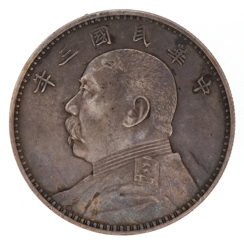 191 - Chinese silver dollar