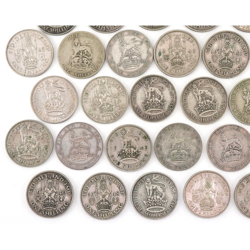 617 - One shilling coins including pre 1947