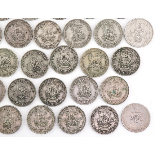 617 - One shilling coins including pre 1947