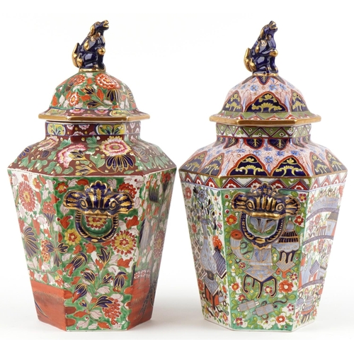 129 - Two Victorian Staffordshire pottery ginger jars and covers hand painted in the Mason style chinoiser... 