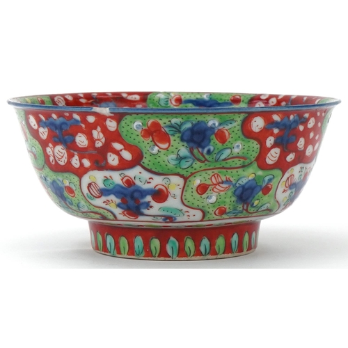 218 - 18th Century Chinese blue and white bowl overpainted with iron red and green, decorated with flowers... 