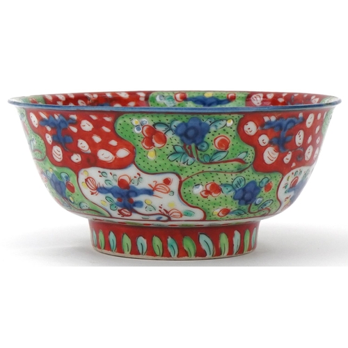 218 - 18th Century Chinese blue and white bowl overpainted with iron red and green, decorated with flowers... 