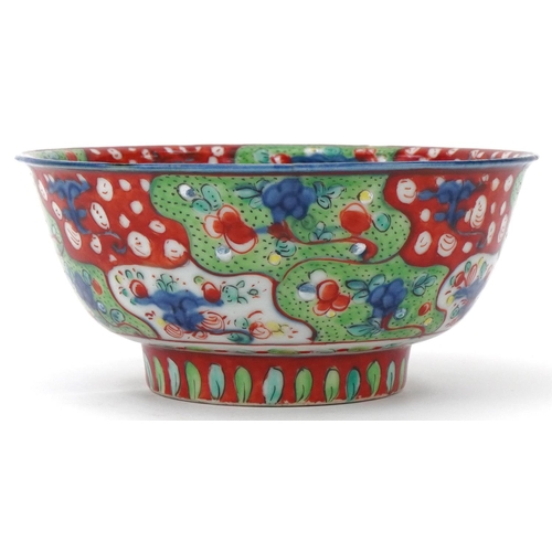 218 - 18th Century Chinese blue and white bowl overpainted with iron red and green, decorated with flowers... 