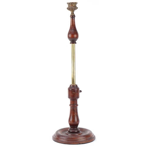 317 - Victorian mahogany and brass rise and fall candlestick with brass sconce, 31cm when closed