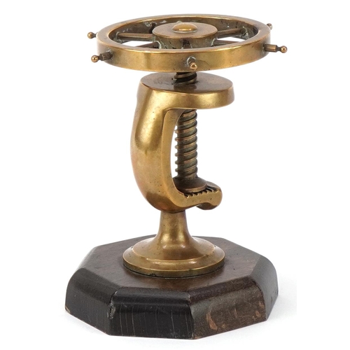 33 - Vintage wooden and brass nutcracker in the form of a ship's wheel, 12cm high