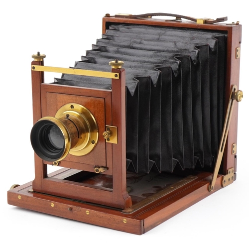 744 - Victorian London Stereoscopic & Co mahogany plate camera with a 7 x 5 brass lens, 21cm x 20cm