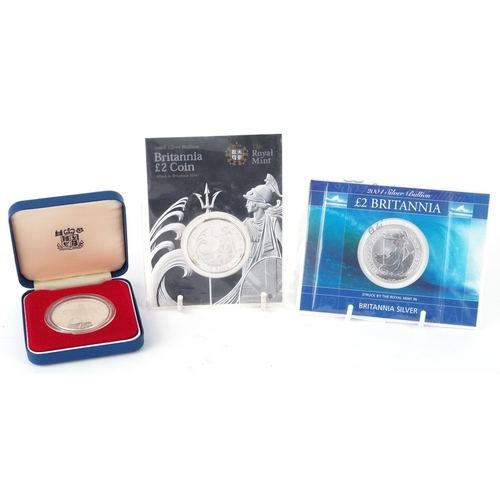 629 - Queen Elizabeth II 2001 silver Britannia proof coin together with 2004 and 2008 Britannia silver bul... 