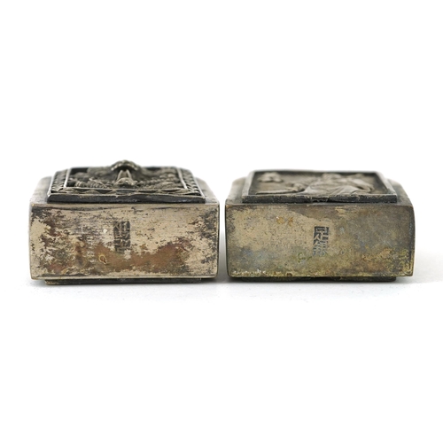 1321 - Pair of Chinese silvered metal scent bottles, character marks to the bases, each 6cm high