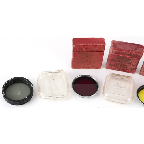 767 - Various Leica Leitz Wetzlar camera lenses and boxes, the largest 4.5cm in diameter