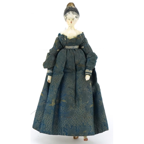 1515 - Georgian hand painted wooden doll with silk dress, 16cm tall