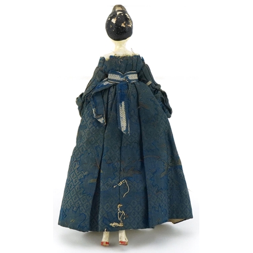 1515 - Georgian hand painted wooden doll with silk dress, 16cm tall