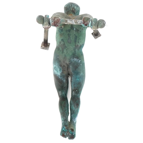 291 - Bronze door knocker of a Greek acrobat, 23cm high