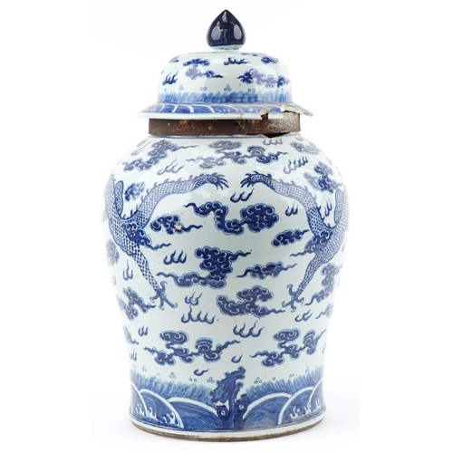 1 - Large Chinese Kangxi jar and cover hand painted with a dragon chasing the flaming a pearl, 66cm high