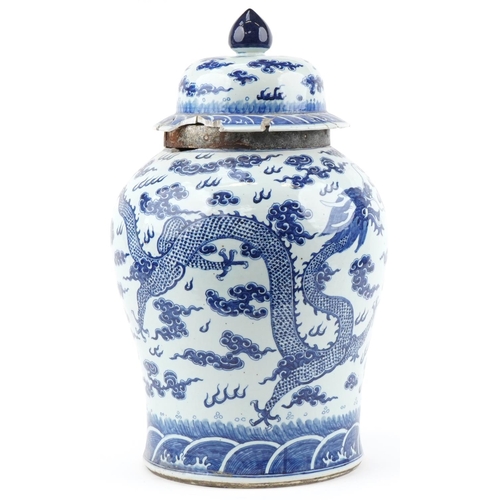1 - Large Chinese Kangxi jar and cover hand painted with a dragon chasing the flaming a pearl, 66cm high