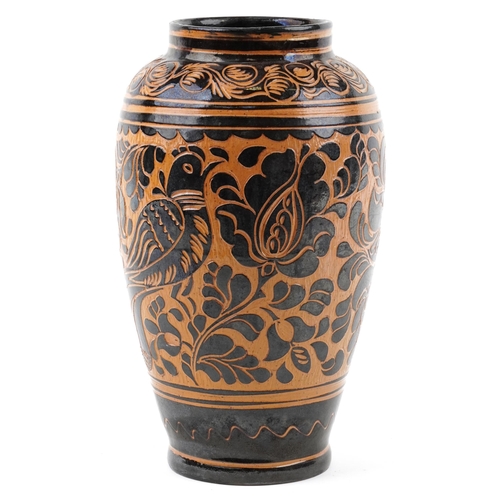 275 - Kiss Mihaly Korond pottery vase with abstract design incised with birds and flowers, 37cm high