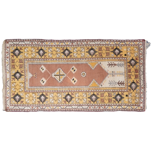 1124 - Large Middle Eastern brown and cream ground prayer rug with geometric borders, 225cm x 112cm