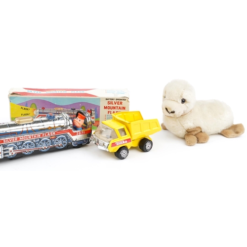 1567 - Battery operated tinplate Silver Mountain Flash train, a similar train, Yellow Tonka dumper and a Me... 