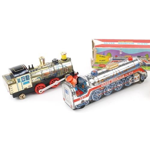 1567 - Battery operated tinplate Silver Mountain Flash train, a similar train, Yellow Tonka dumper and a Me... 