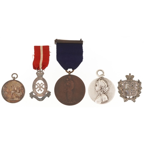 693 - Boxed silver poultry medal and other medals and badges including a St Marylebone infirmary for Hilda... 