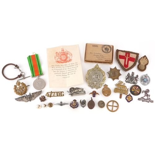 1738 - Assorted military interest cap badges including Argyll & Sutherland, military watch chain, patches a... 