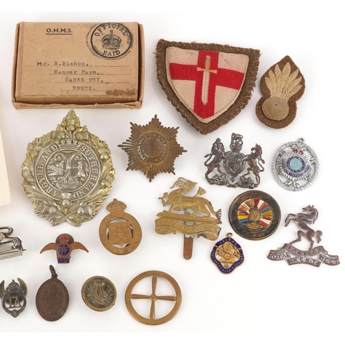 1738 - Assorted military interest cap badges including Argyll & Sutherland, military watch chain, patches a... 