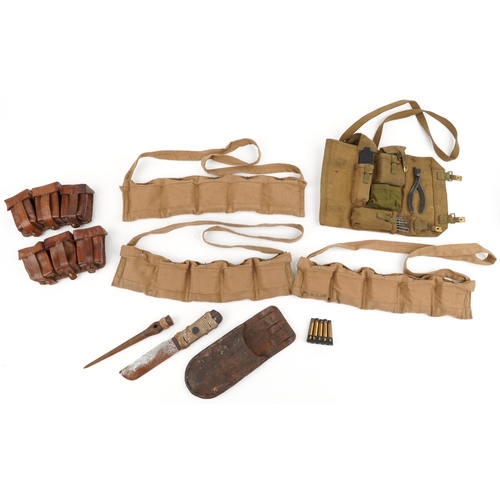 1797 - Military interest World War II leather and canvas bullet belts together with a canvas tool kit inclu... 