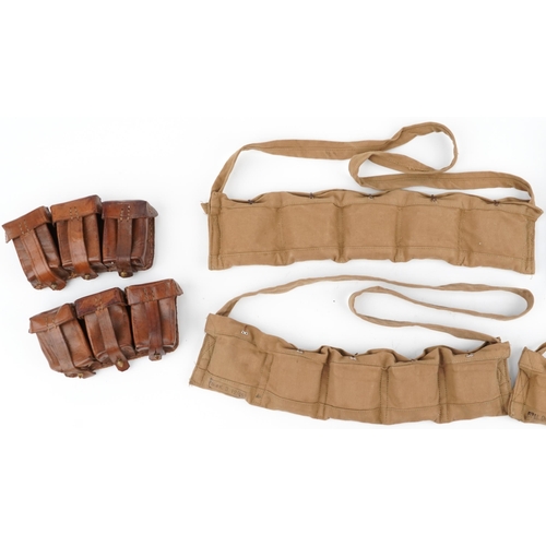 1797 - Military interest World War II leather and canvas bullet belts together with a canvas tool kit inclu... 