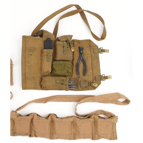 1797 - Military interest World War II leather and canvas bullet belts together with a canvas tool kit inclu... 