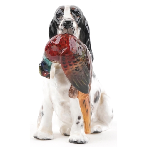 1175 - Royal Doulton seated Cocker Spaniel with Pheasant, HN1137, 17cm in length