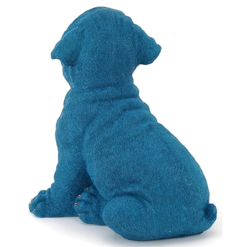 1318 - Novelty blue painted model of a comical happy dog, 27cm high