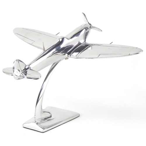 1329 - Chromed model of a military aeroplane, 36cm wide