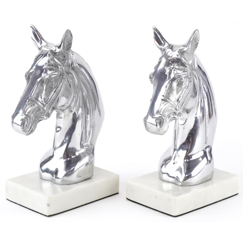 1471 - Pair of silvered metal and white marble horsehead bookends, each 23cm high