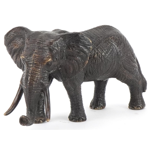 1445 - Japanese patinated okimono of a bull elephant, 30cm in length