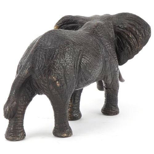 1445 - Japanese patinated okimono of a bull elephant, 30cm in length