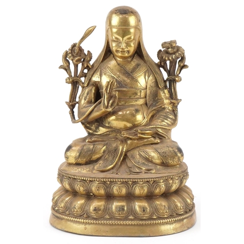 186 - Chino Tibetan gilt bronze Buddha, 24cm high