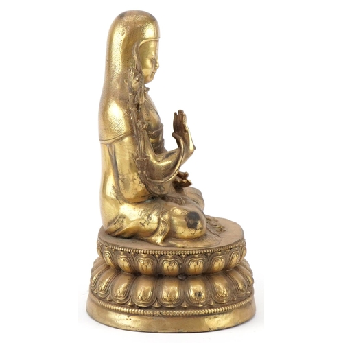 186 - Chino Tibetan gilt bronze Buddha, 24cm high