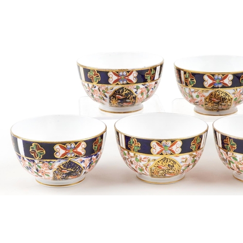 80 - Seven  Victorian Royal Crown Derby porcelain bowls decorated in the Imari palette, each 10.5cm in di... 